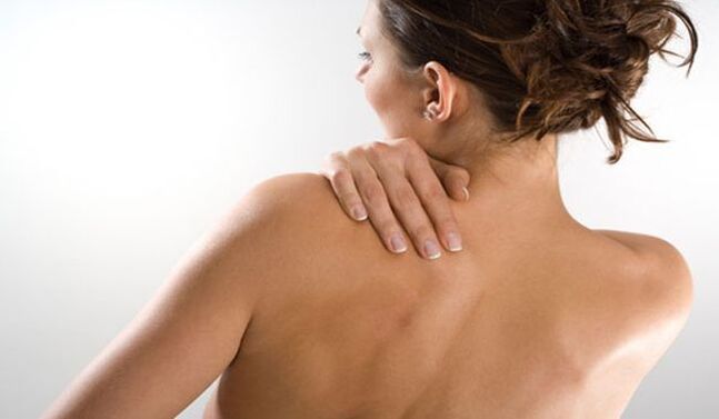 The woman is worried about the pain under the left shoulder blade in the back from the back