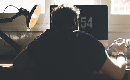 A man at a computer